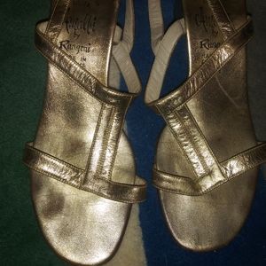Well used gold Italian dress shoes